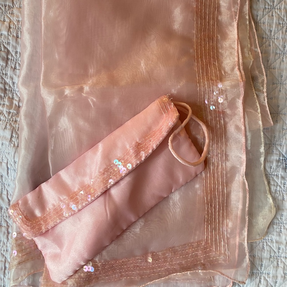 Sheer Pink wrap w/sequin border and marching pink satin wristlet w/sequins.